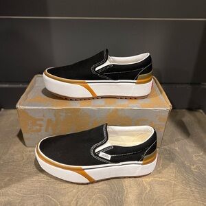 Ladies black platform slip on sneakers size 6.5 VANS